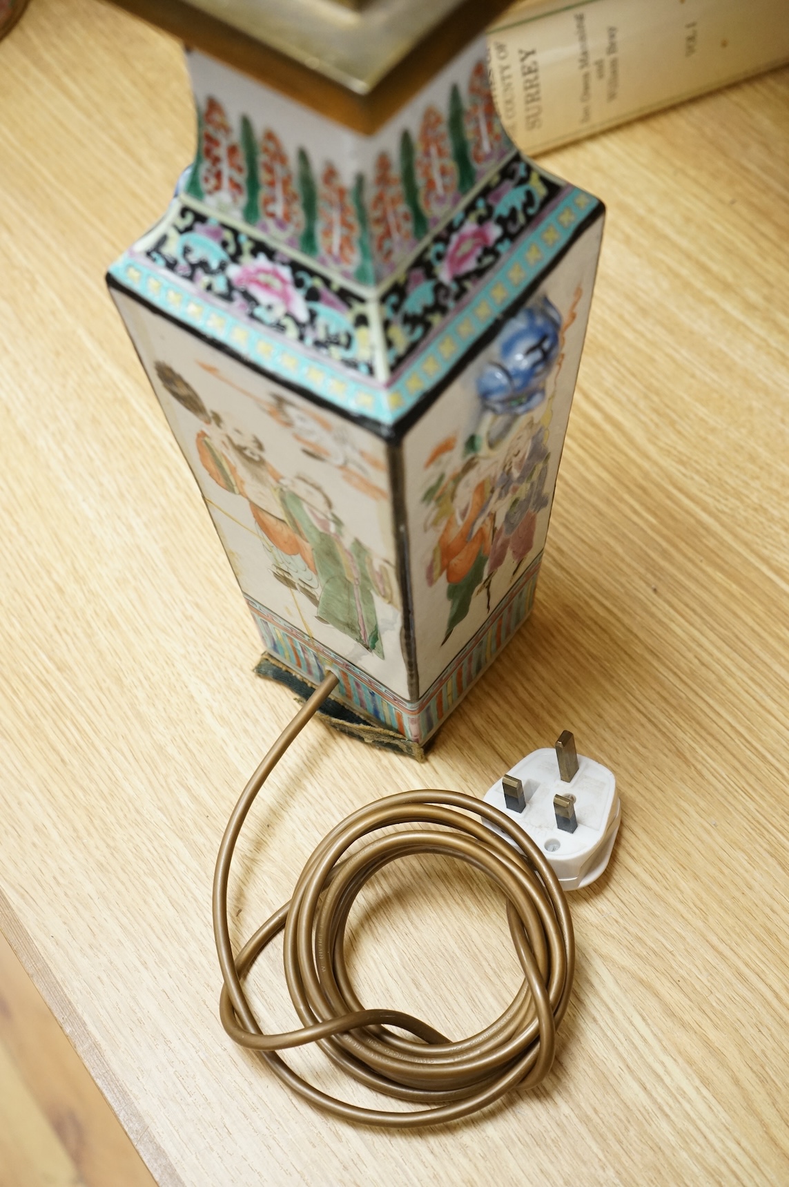 A Chinese famille rose square vase, early 20th century, mounted as a lamp, 37cm high not including light fitting.